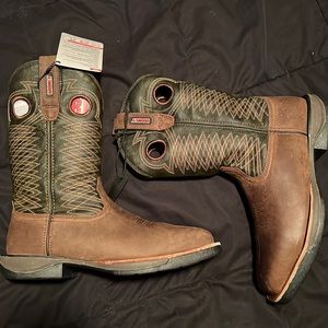 Size 8 steel toe slip on rocky boots , new with tags and in box